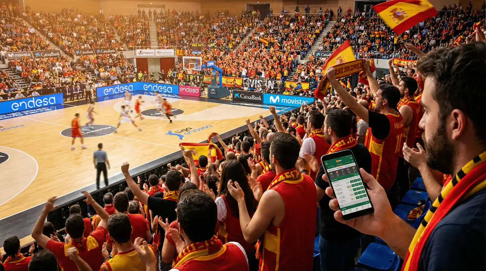 Aficionados españoles apasionados en un pabellón de baloncesto ACB animando con bufandas mientras uno consulta su móvil